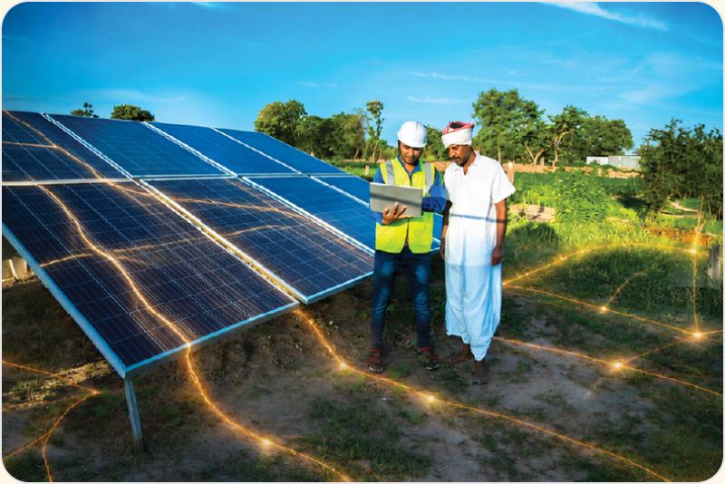 Engineers reviewing data at a solar farm