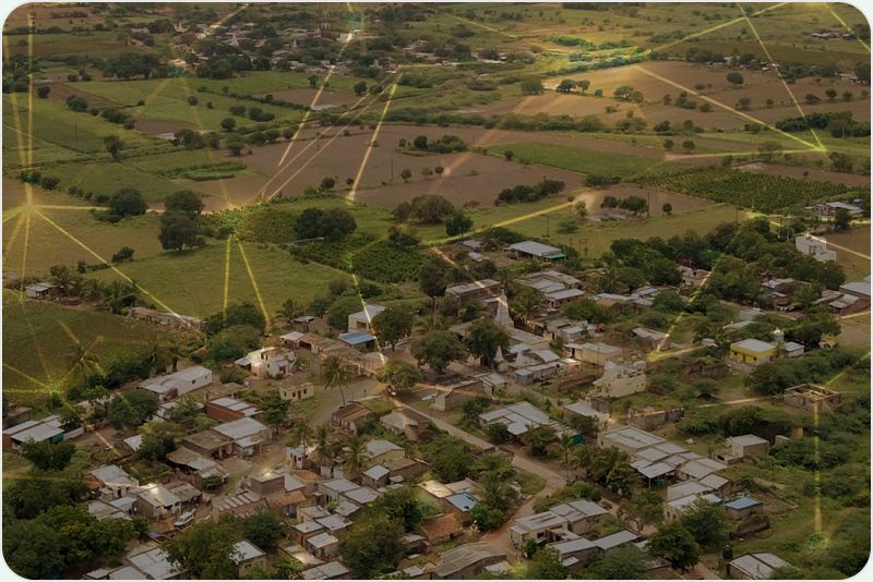 Aerial view of farmland and a village
